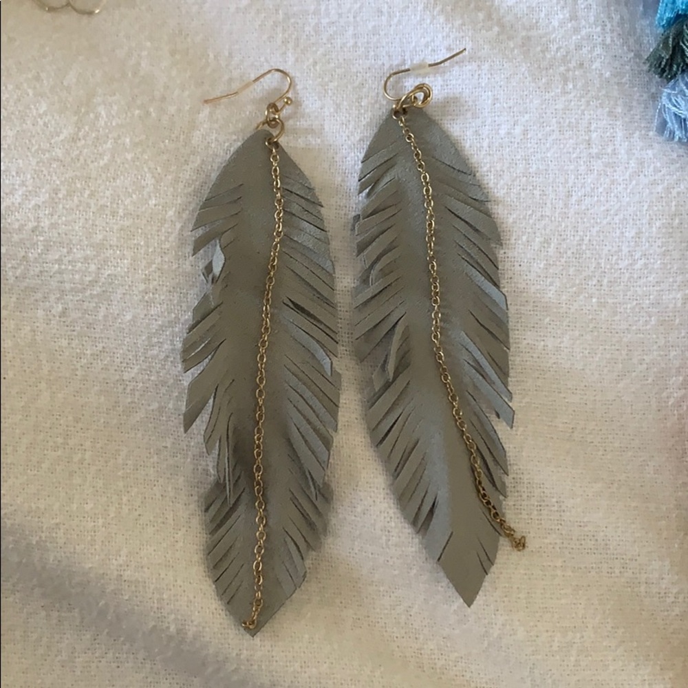 Feather statement earrings!